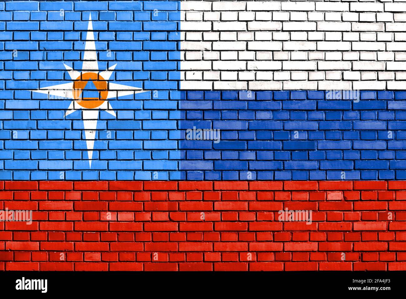 Bandera del Ministerio de Situaciones Extraordinarias de Rusia pintada en ladrillo pared Foto de stock