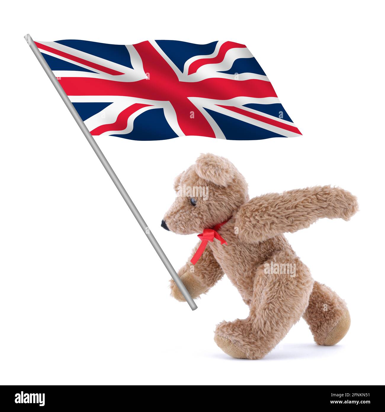 Reino Unido El gato de la bandera británica que está siendo transportado por un lindo oso de peluche Foto de stock