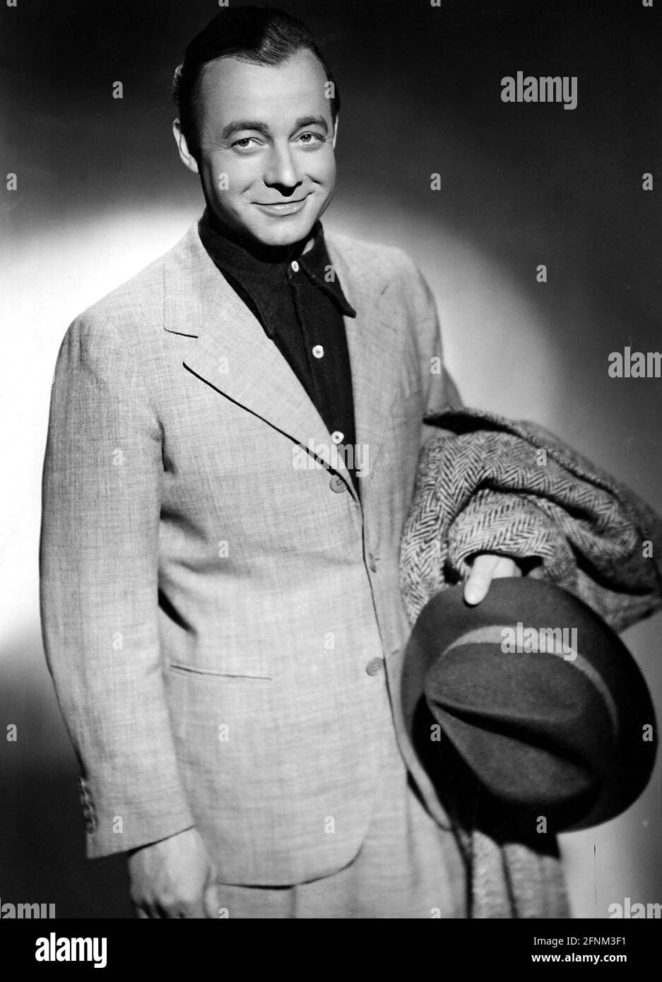 Ruehmann, Heinz, 7.3.1902 - 3.10.1994, actor alemán, de media longitud, Con sombrero y abrigo, alrededor de 1950, DERECHOS-ADICIONALES-LIQUIDACIÓN-INFORMACIÓN-NO DISPONIBLE Foto de stock