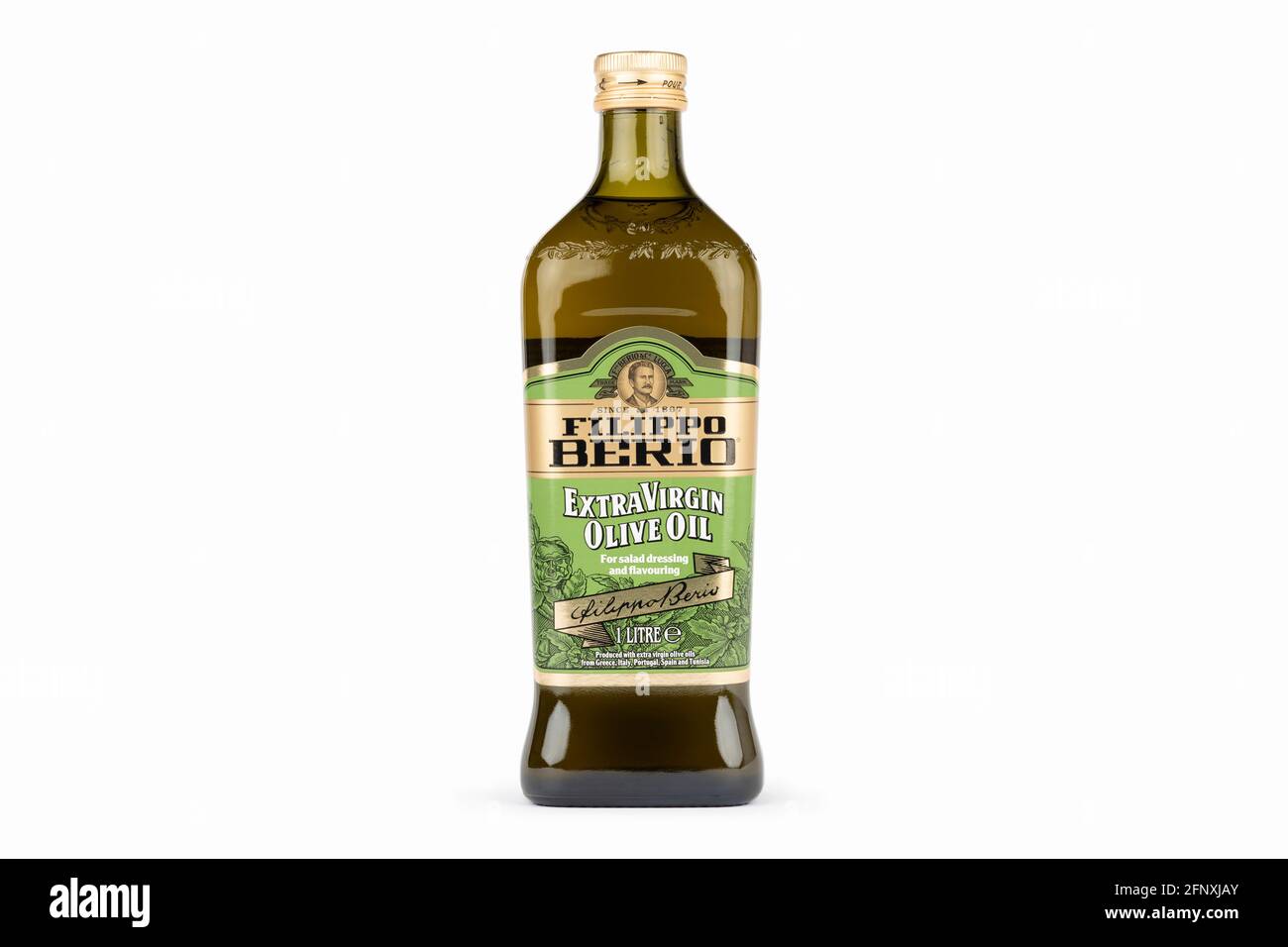 Una botella de aceite de oliva Filippo Berio rodó sobre un fondo blanco. Foto de stock