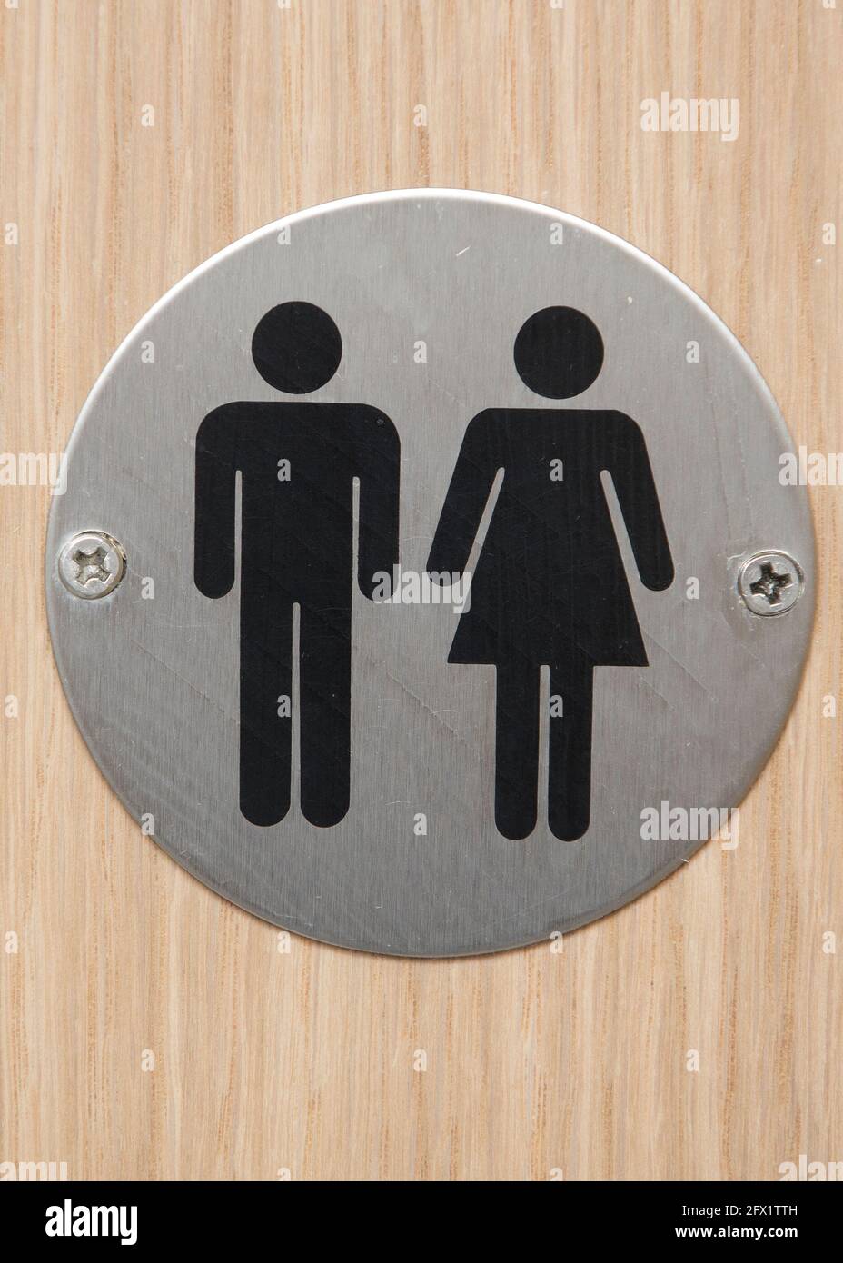 Señal de baño unisex neutral para género Foto de stock