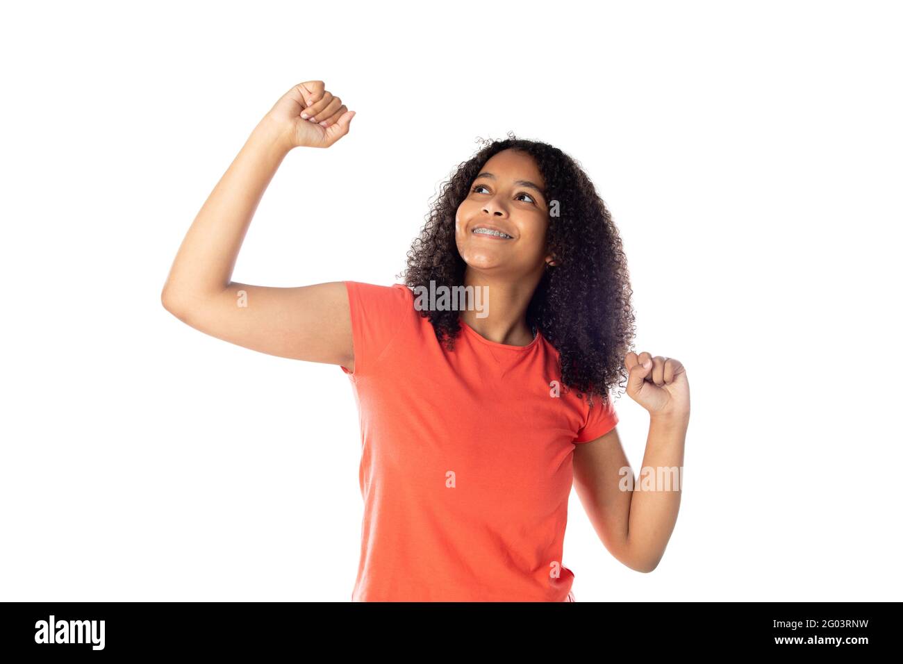 Alegre estudiante negra con pelo afro aislado en un fondo blanco Foto de stock