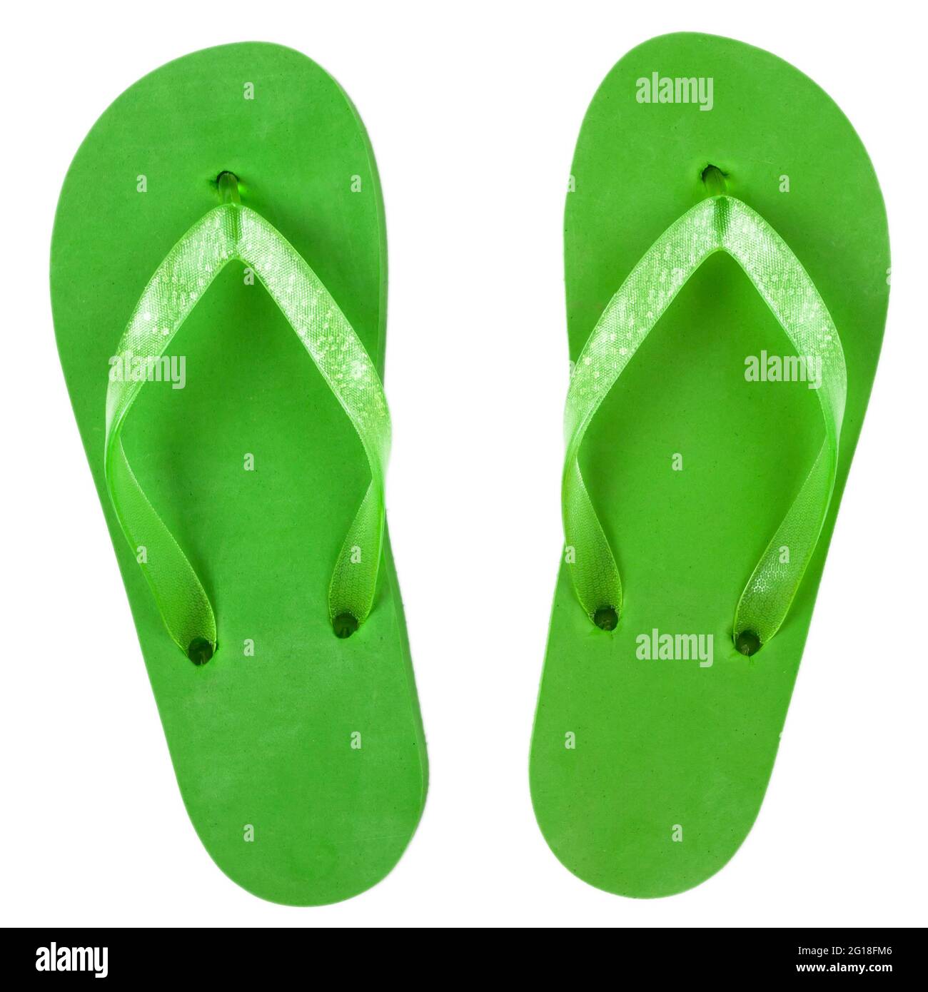 chanclas de goma verde en la playa sobre un fondo blanco, aislar, vista  desde arriba Fotografía de stock - Alamy