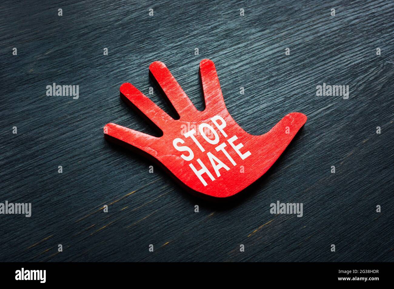 Pare la frase del odio en la mano pequeña. Foto de stock