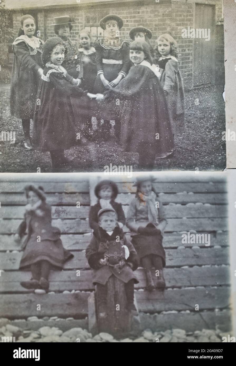 A principios del siglo 20th auténticas fotografías vintage de niños jugando y sentados juntos. Concepto de infancia, nostalgia, histórico Foto de stock
