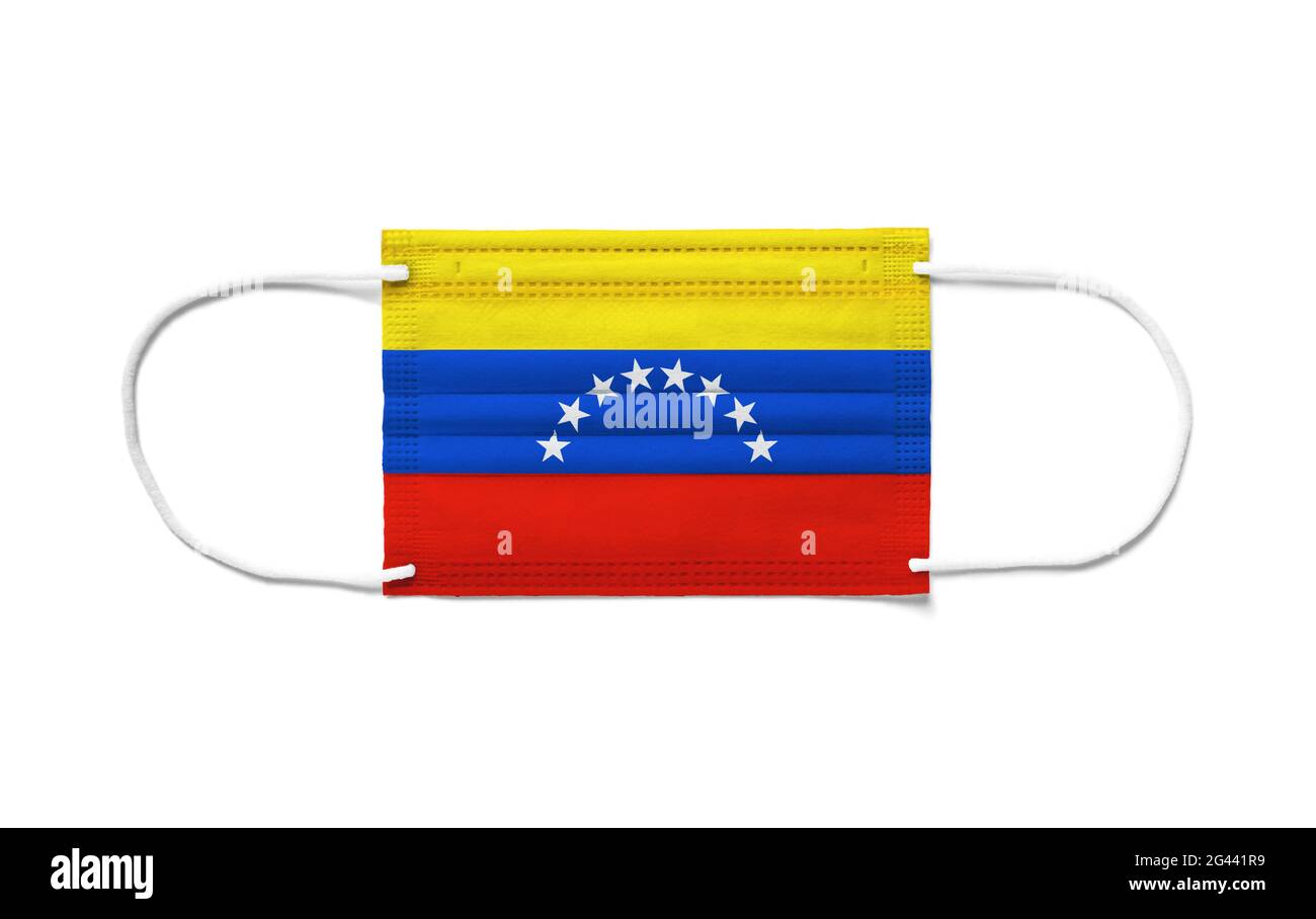 Bandera de Venezuela en una máscara quirúrgica desechable. Fondo blanco Foto de stock
