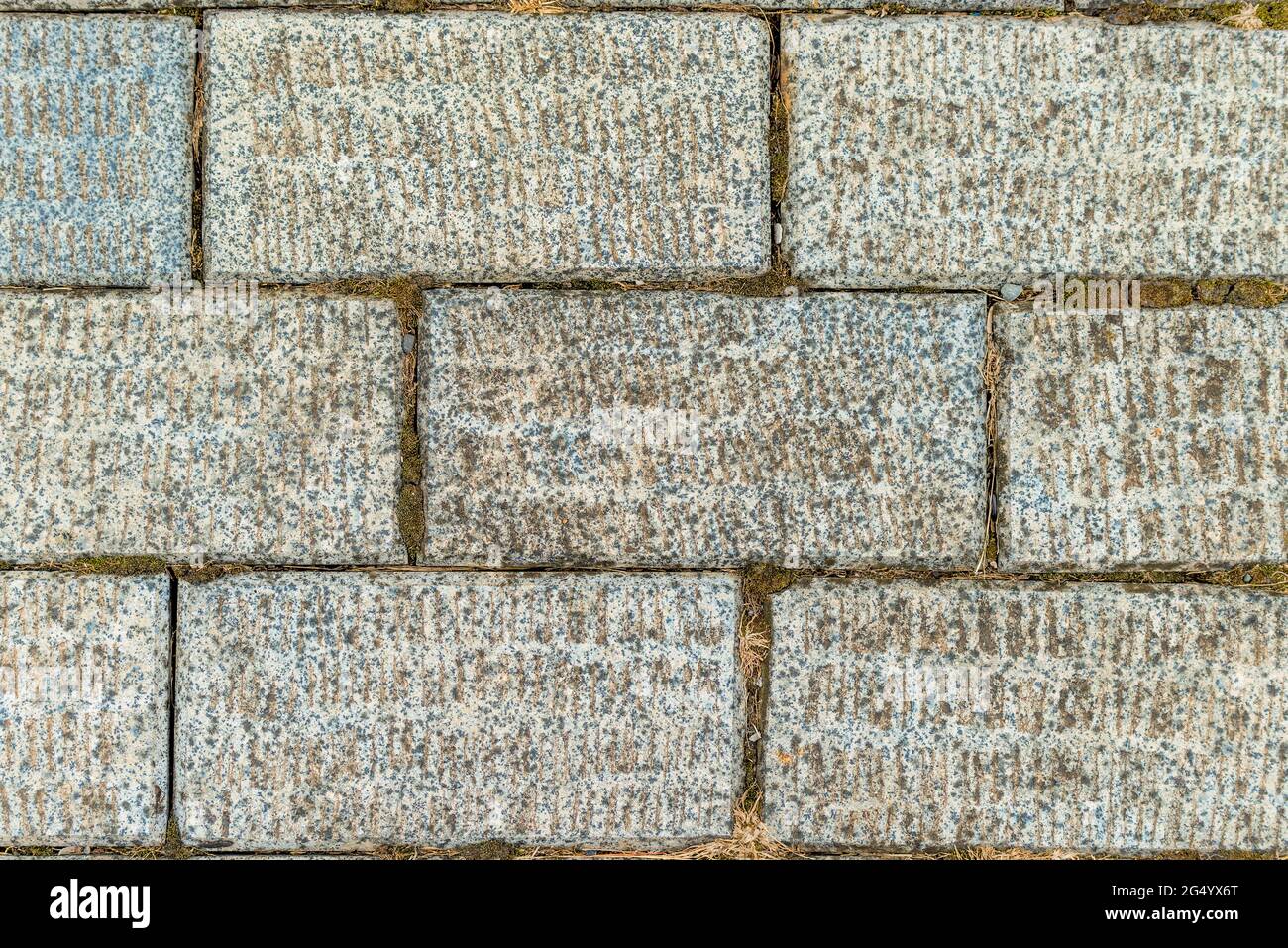 Calle de concreto piso azulejos textura de fondo en gris Foto de stock