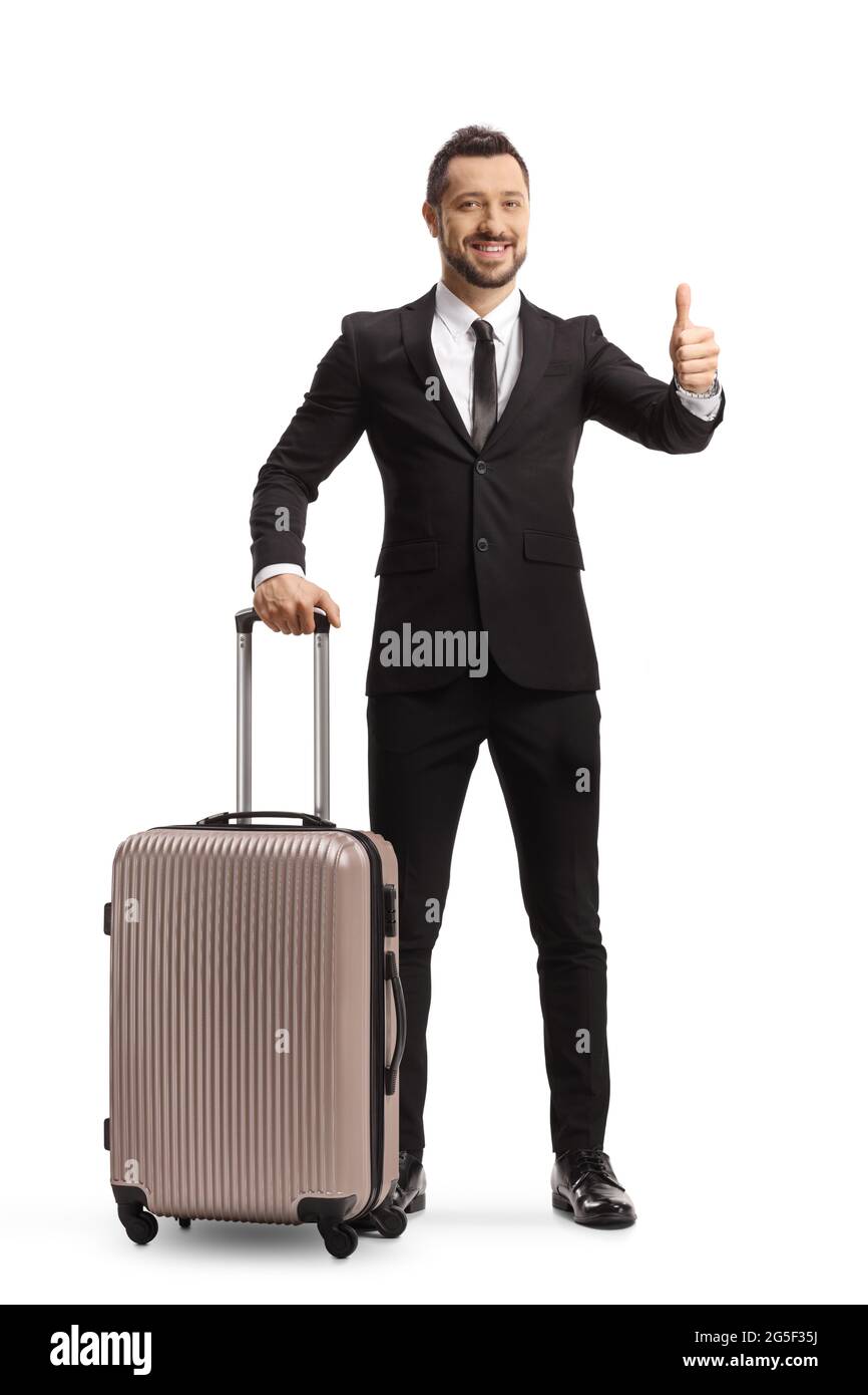 Retrato completo de un hombre de negocios con una maleta sobre ruedas  mostrando pulgares aislados sobre fondo blanco Fotografía de stock - Alamy