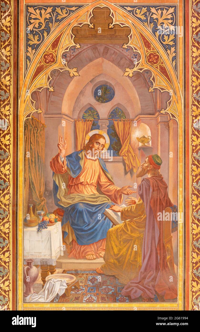 VIENA, AUSTIRA - JUNI 24, 2021: La conversación al fresco entre Nicodemo y Jesús en la iglesia Votivkirche de los hermanos Carl y Franz Jobst Foto de stock