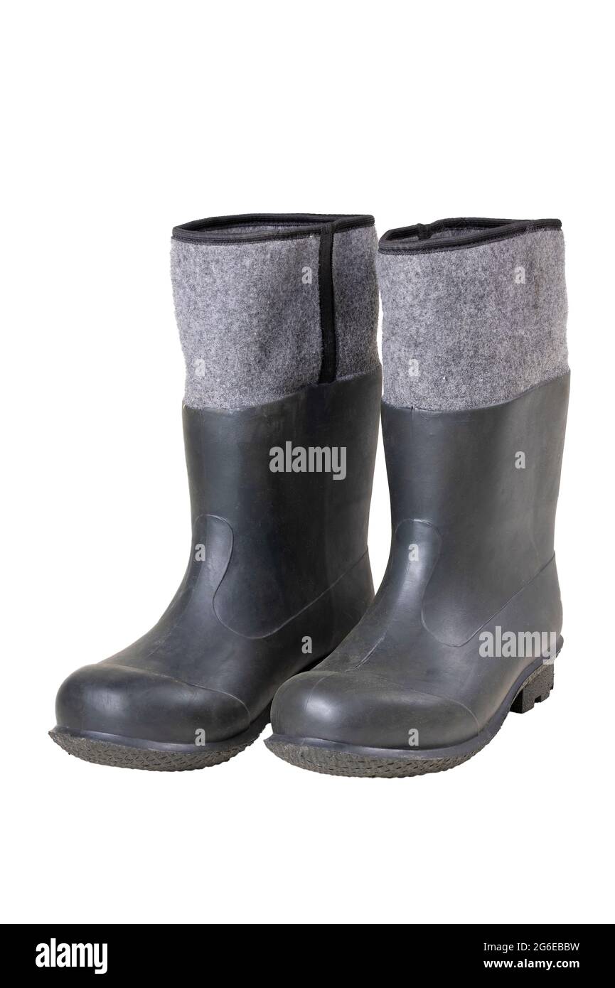 Botas de goma para los trabajadores de producción. Ropa de trabajo con la  que están equipados los trabajadores que trabajan en el campo. Fondo  aislado Fotografía de stock - Alamy