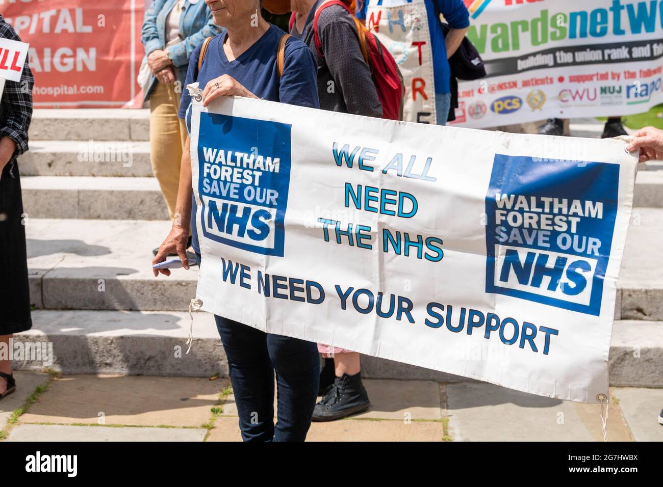 Londres, Reino Unido. 14th de julio de 2021. Mantenga nuestra protesta pública del NHS fuera de las Casas del Parlamento Crédito: Ian Davidson/Alamy Live News Foto de stock