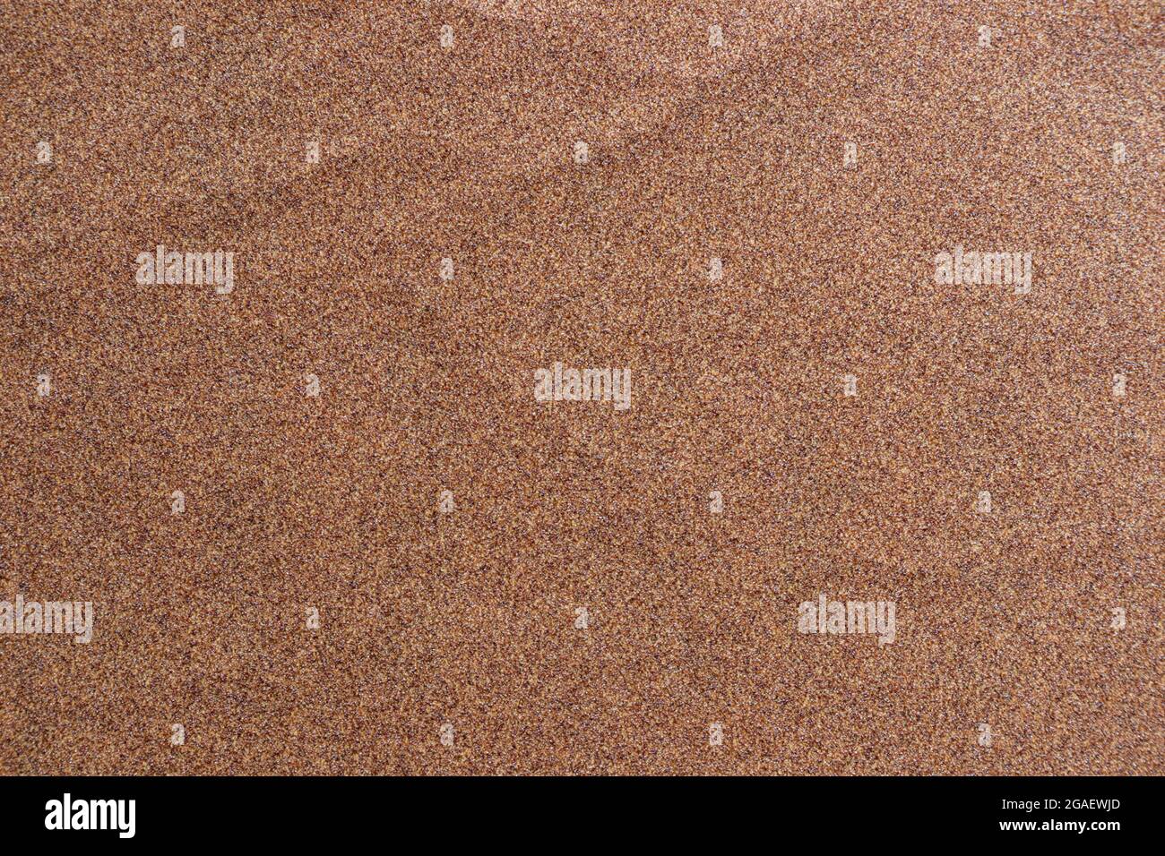 Fondo de textura de papel de lija donde puede ver el patrón de grano de  arena marrón-rojo en el papel de lija, adecuado como fondo para insertar  texto. Copiar Sp Fotografía de