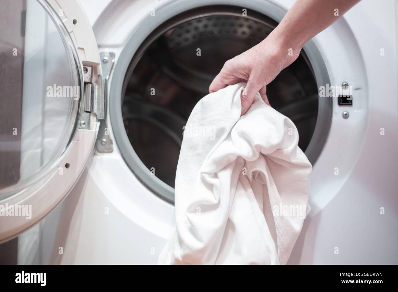 Una máquina para lavar ropa, ropa de cama, etc Fotografía de stock - Alamy