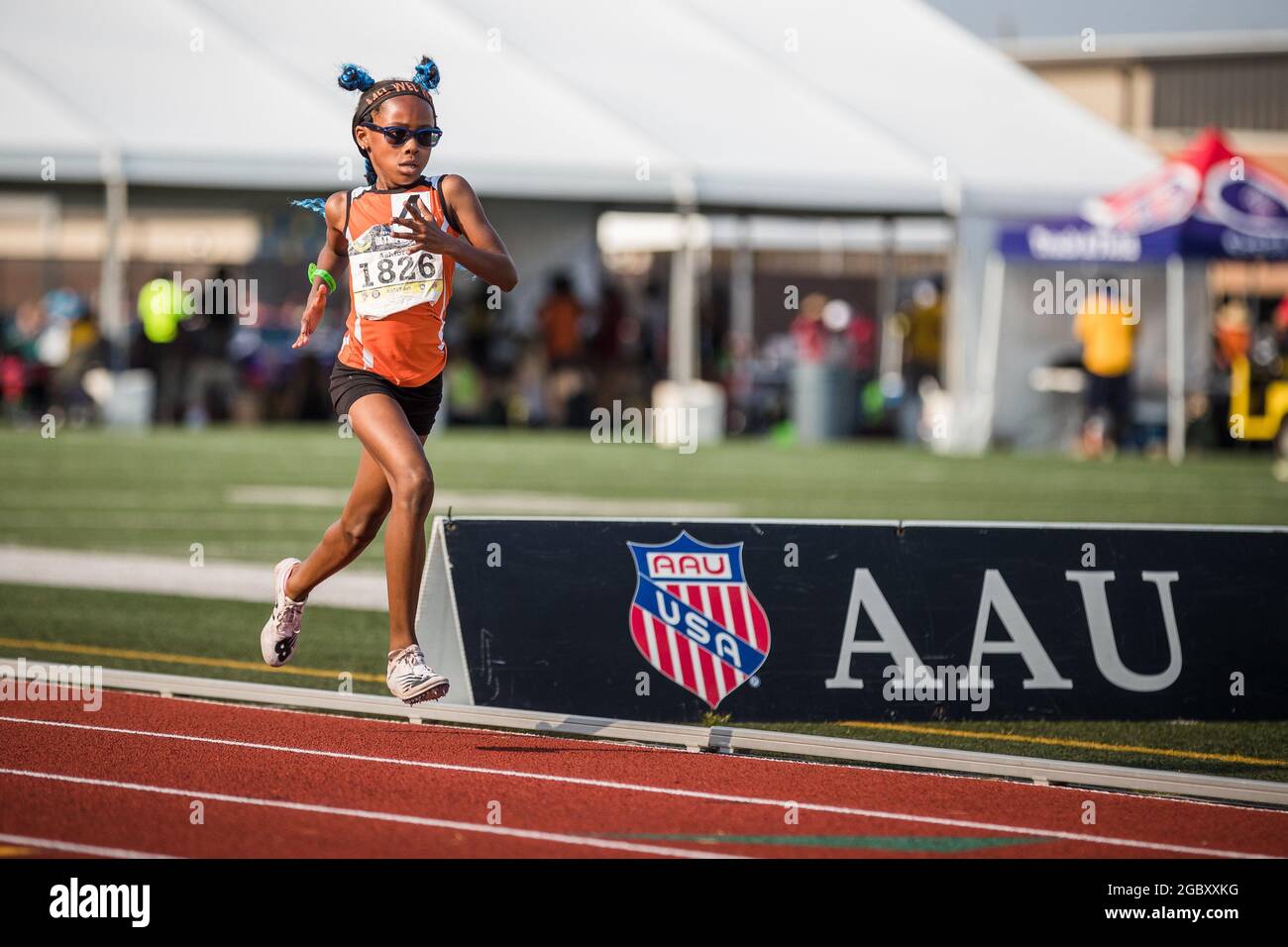 Texas, Estados Unidos. 5 de agosto de 2021: Melodi Ashford compite durante  la carrera de 1500 metros de niñas de nueve años en los Juegos Olímpicos  Junior de la AAU 2021 en