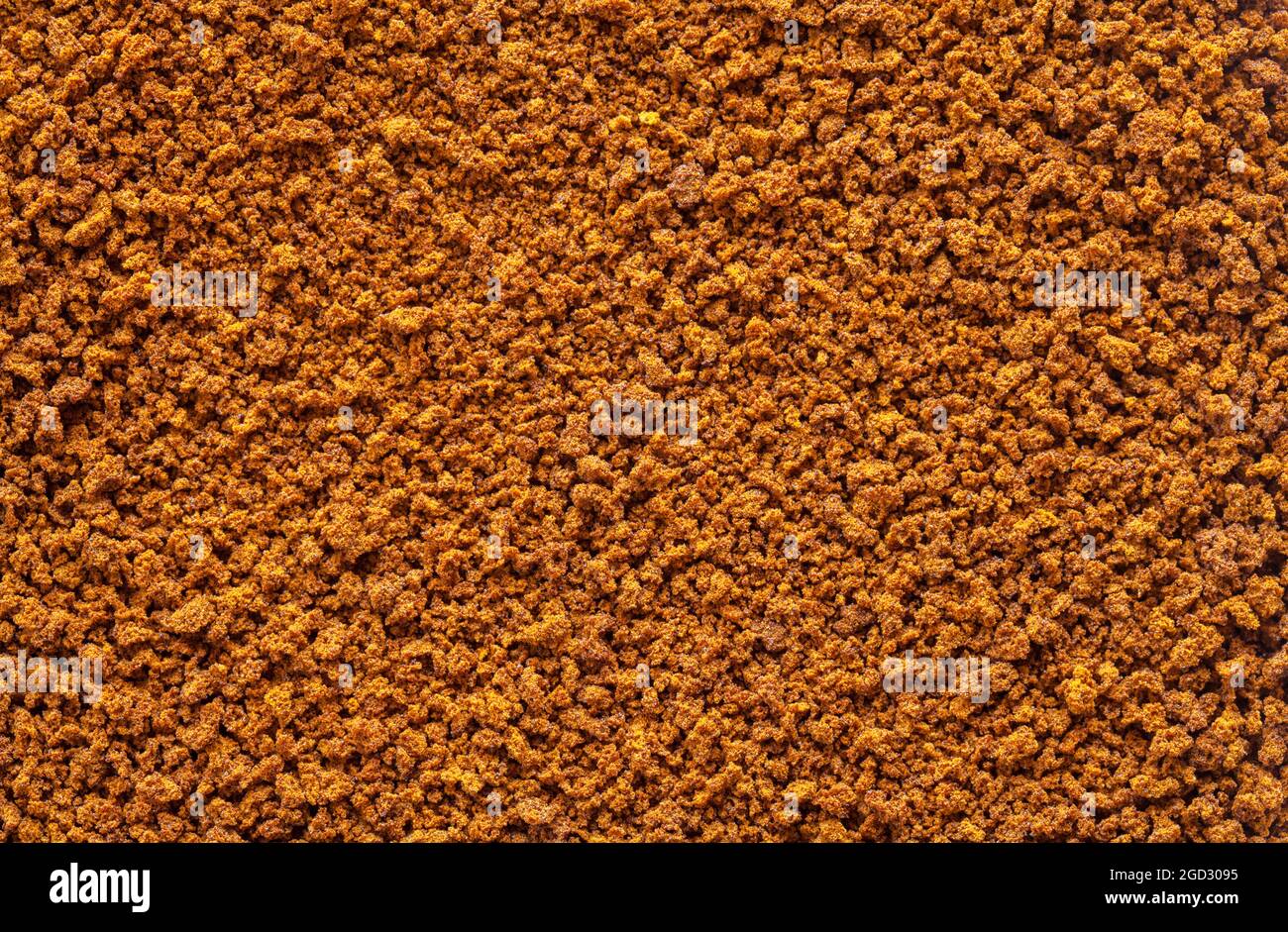 Primer plano de la textura de fondo café instantáneo marrón. Foto de stock
