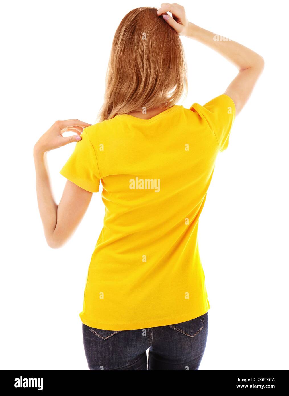 Exceder Cartas credenciales suerte Mujer joven en blanco camiseta amarilla sobre fondo blanco Fotografía de  stock - Alamy