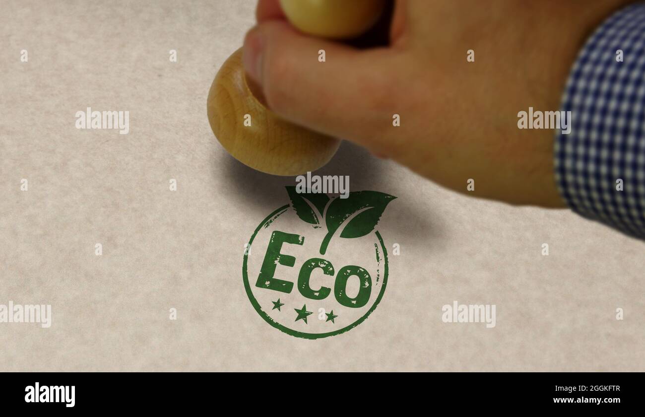 Sello ecológico y mano estampada. Concepto de ecología, medio ambiente y clima. Foto de stock