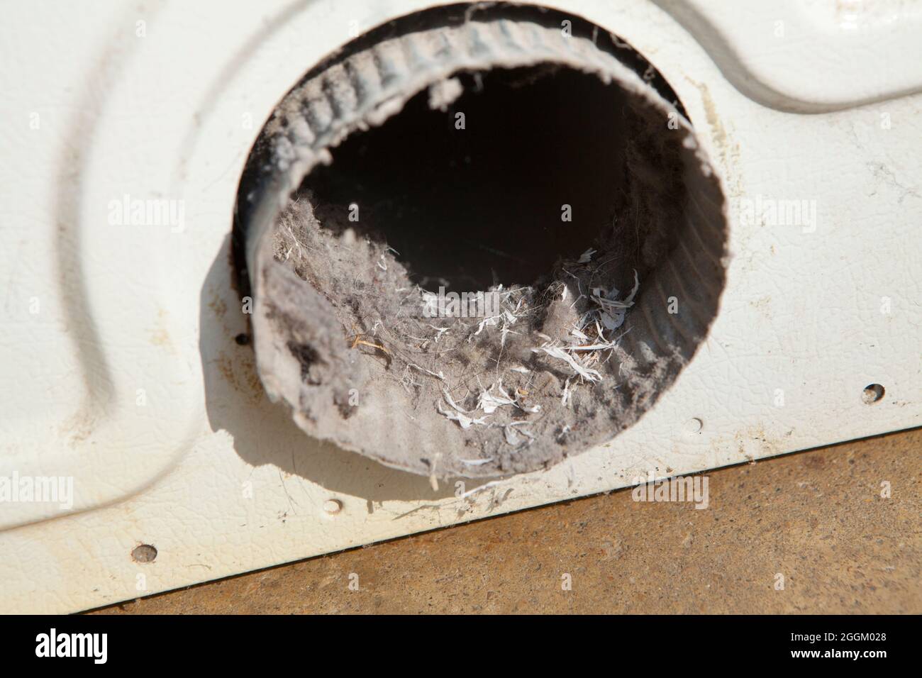 Pelusas en la rejilla de ventilación de la secadora - EE.UU Foto de stock