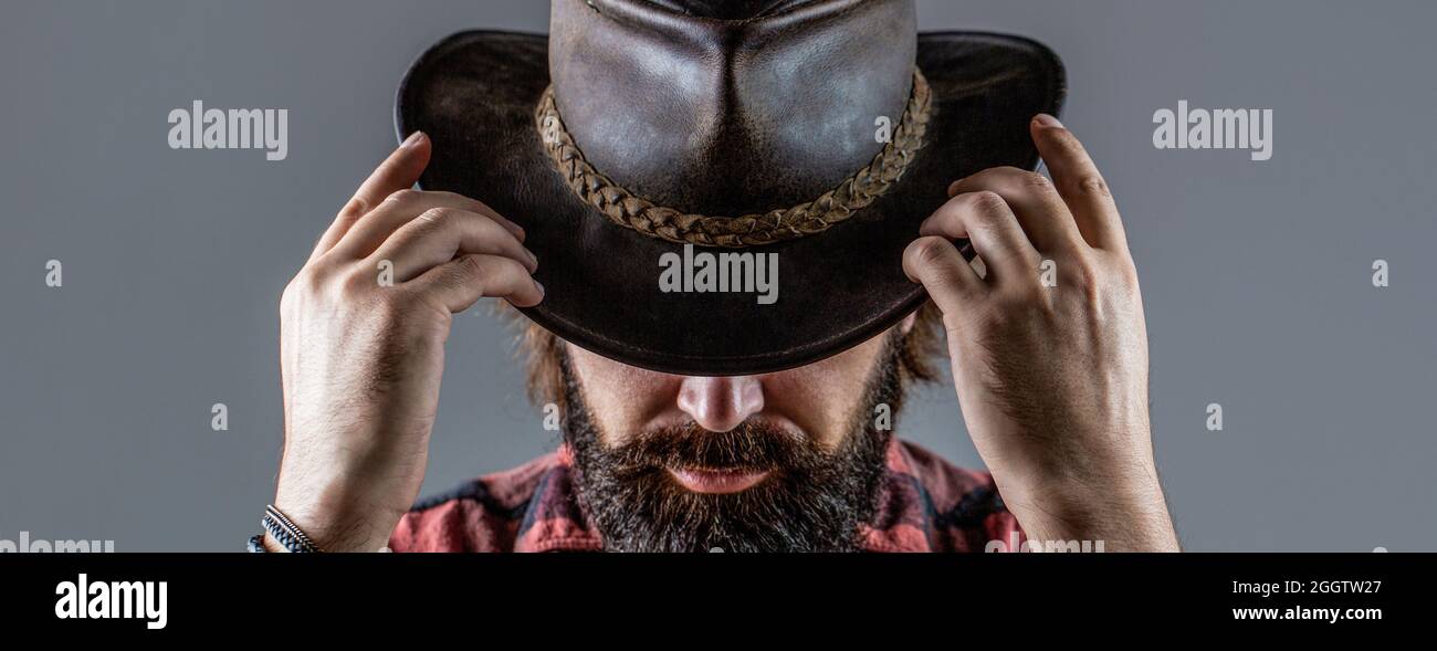 Vaqueros en sombrero. Guapo macho barbudo. Hombre vaqueros sin Vaquero americano. Sombrero vaquero de piel. Retrato del con sombrero de vaquero Fotografía de stock - Alamy