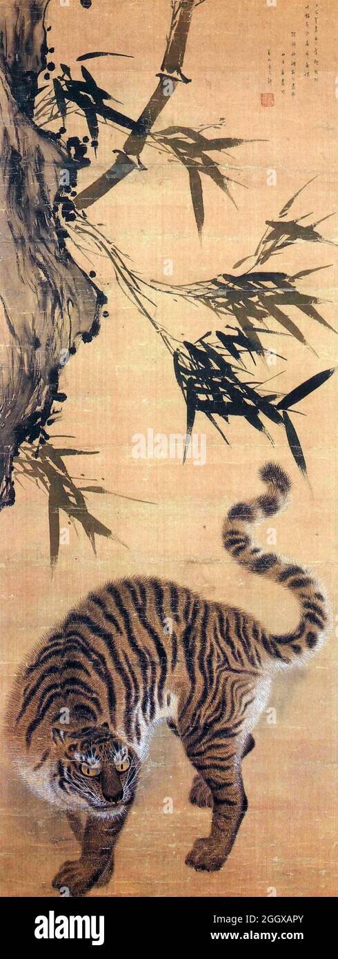 Tigre bajo el bambú por el artista coreano Kim Hong-do (1745-c.. 1806-1814), color sobre seda, finales del siglo 18th Foto de stock