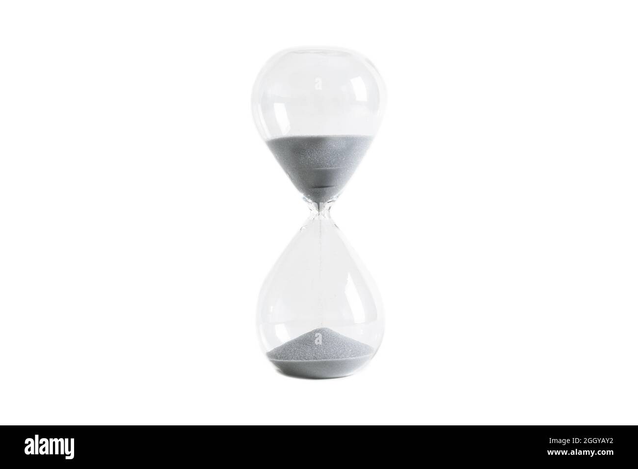 Hourglass aislado sobre fondo blanco. El paso del tiempo Foto de stock