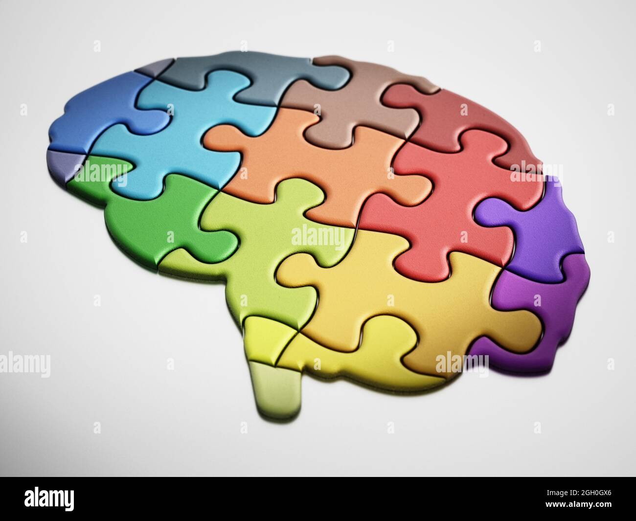 Piezas de coloridas que forman un cerebro en conjunto. Ilustración Fotografía de stock Alamy