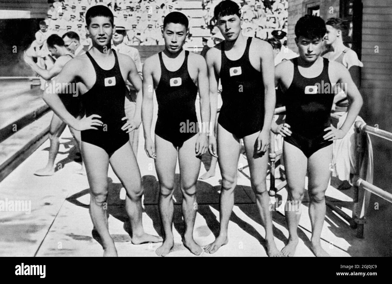 El relé Erdreil 4 x 200m competición olímpica, en Berlín 1936. Esta imagen muestra el destacado equipo de relevos japonés (l-r) Miyazaki, Yusa, Toyoda, Yokojama. Este equipo se considera generalmente como imbatible. ©Topfoto Foto de stock