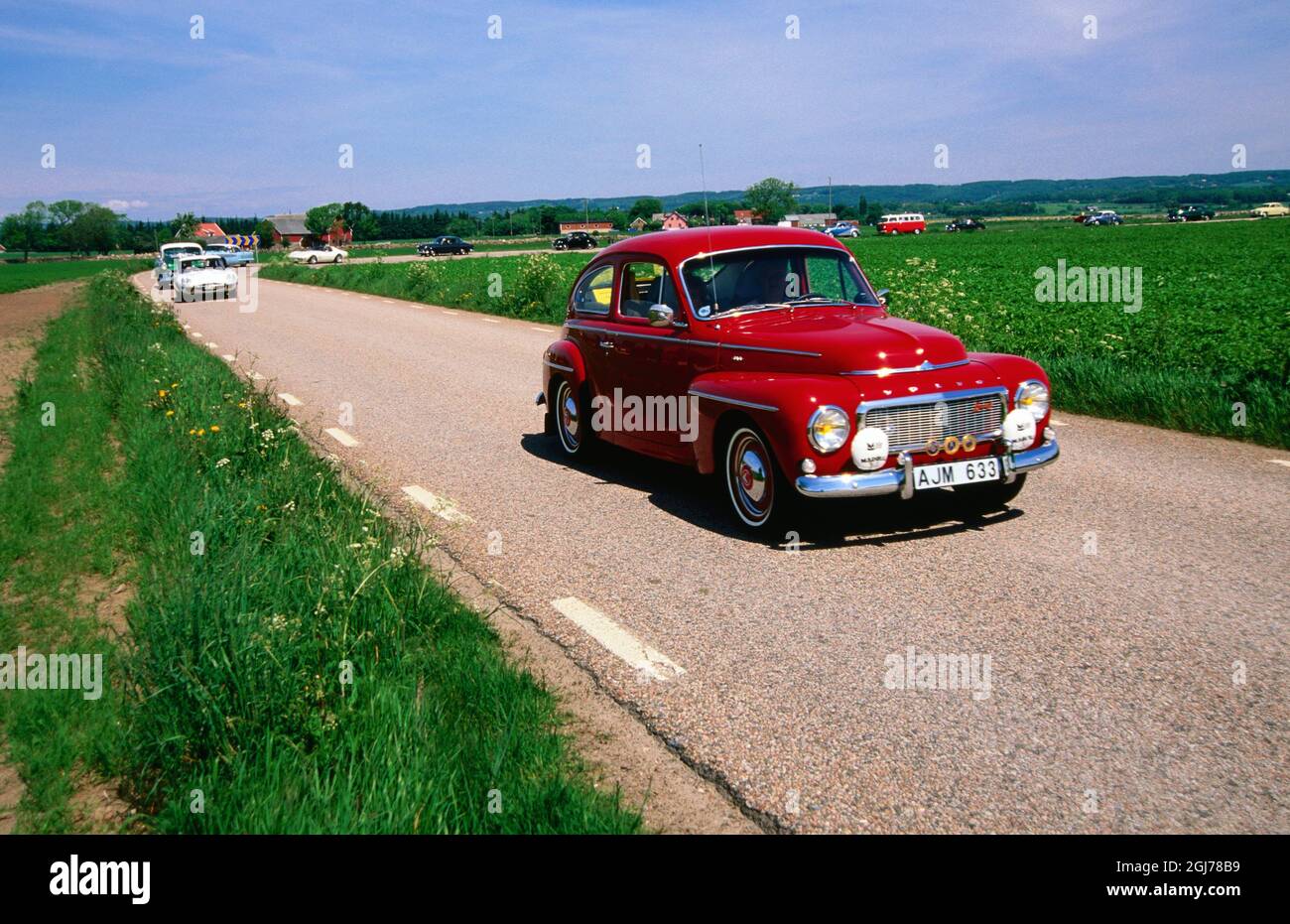 Histórico rally de coches dirigido por Volvo PV 544 de los años 60. Foto de stock