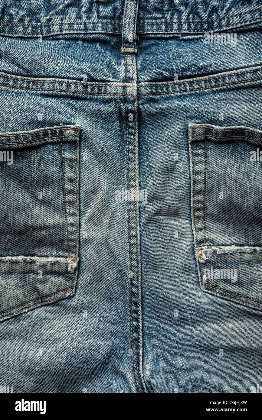 Parte posterior de los antiguos jeans denim. Foto de stock