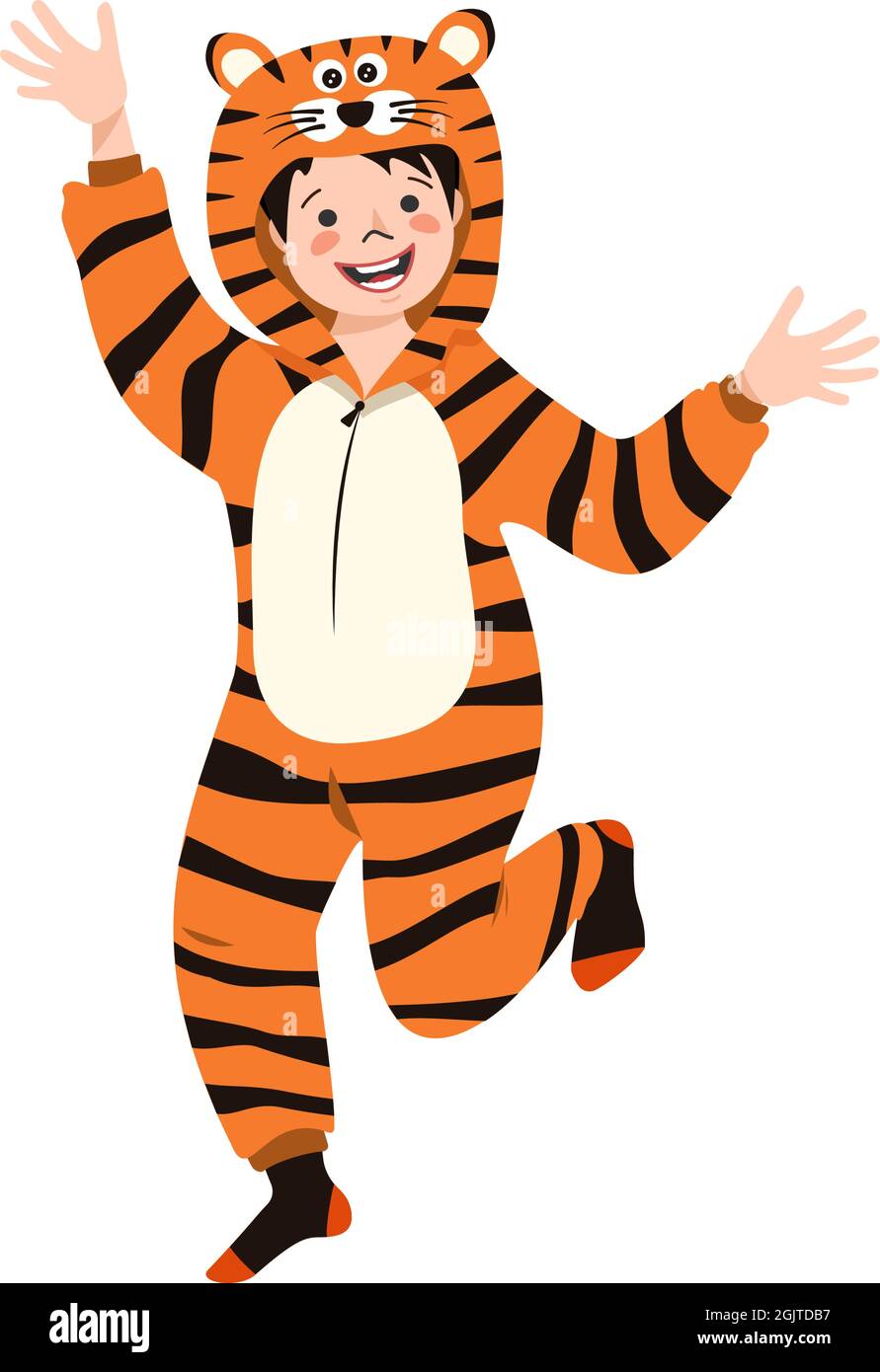 Un niño en un traje de carnaval de un tigre. Fiesta de pijama para niños.  Niños con trajes de jumpers o kigurumi, ropa festiva para el año nuevo,  Navidad o vacaciones Imagen
