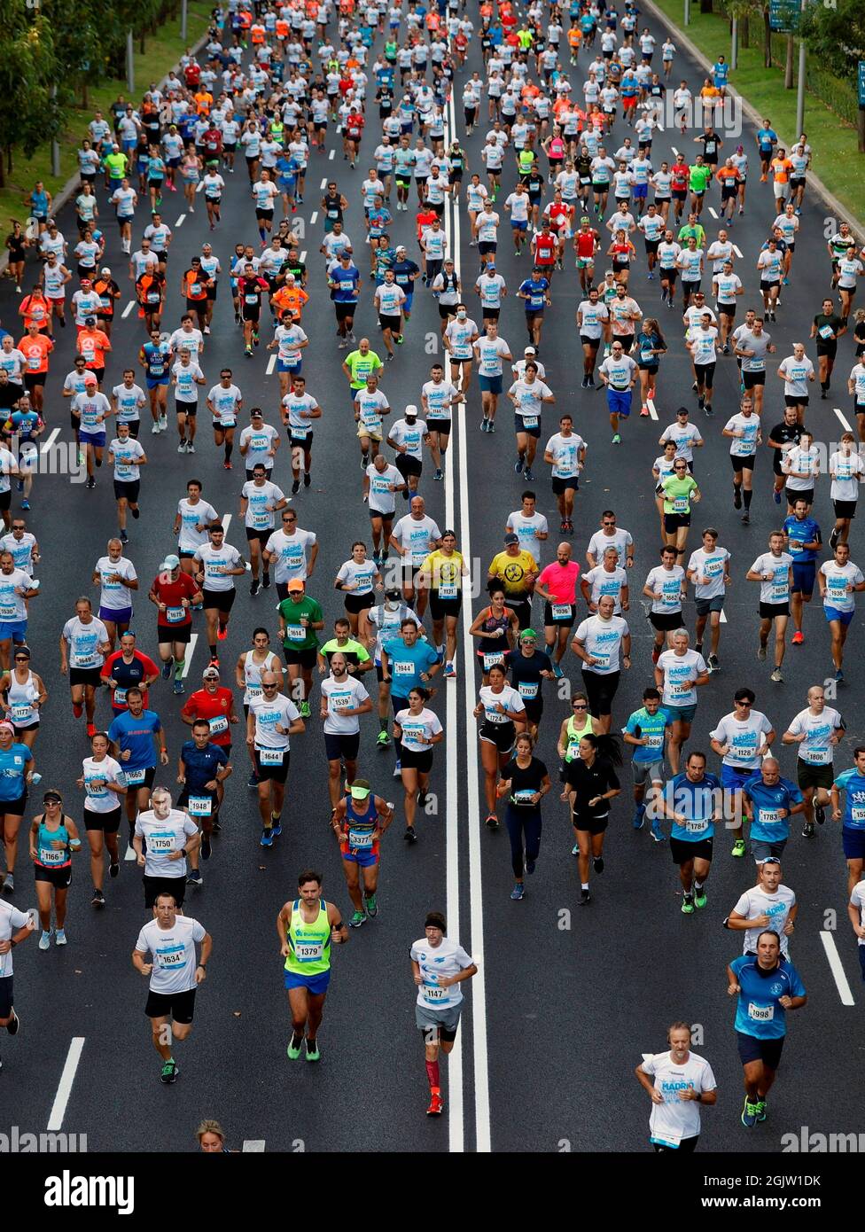 Madrid, España. 12 de septiembre de 2021. Los corredores en acción durante  la carrera benéfica dan derecho a 'Madrid corre por Madrid' de 10  kilómetros en los que se permite a 5.000