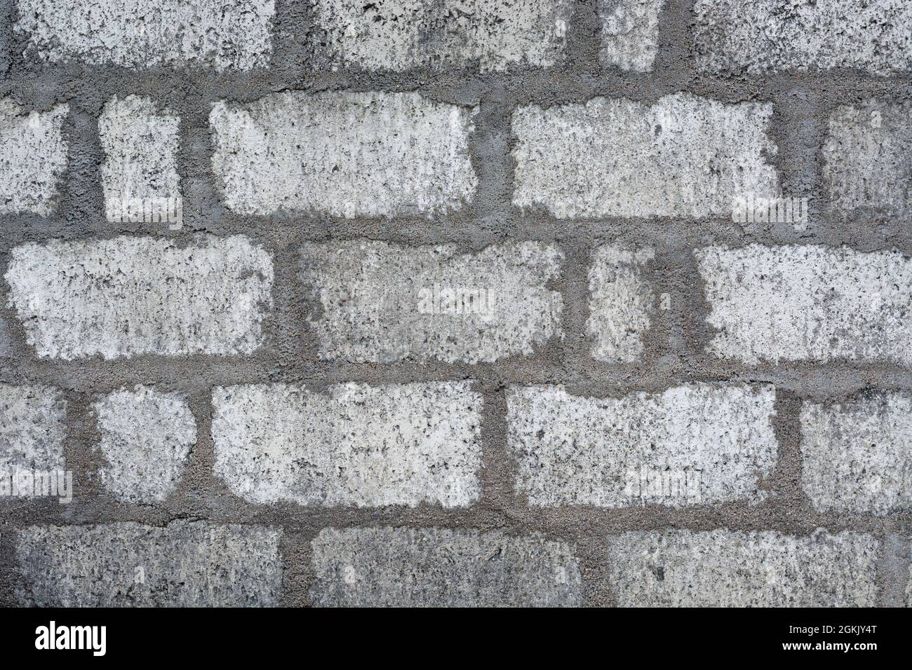 pared de hormigón con bloques de cemento y yeso, superficie de capas de  ladrillo de mortero gris claro, papel pintado de mampostería, fondo,  textura Fotografía de stock - Alamy