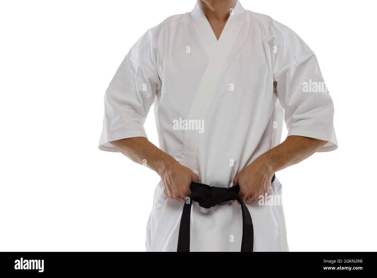 Retrato recortado del hombre en kimono con cinturón negro aislado sobre  fondo blanco. Karate, judo, deportista taekwondo Fotografía de stock - Alamy