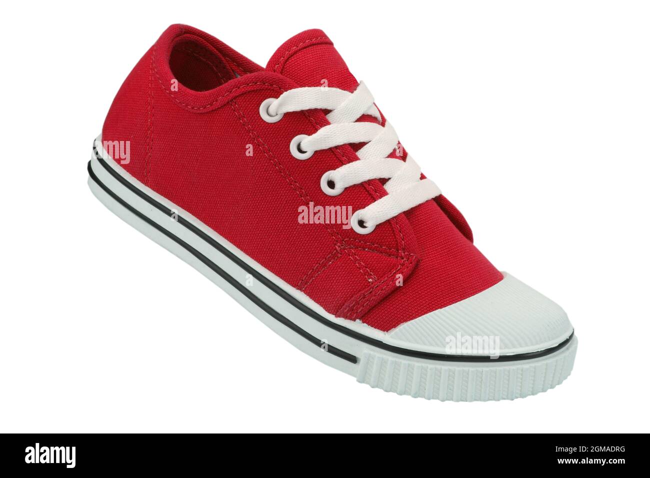 zapato de lona roja aislado sobre fondo blanco, zapatos de lona para niños Foto de stock