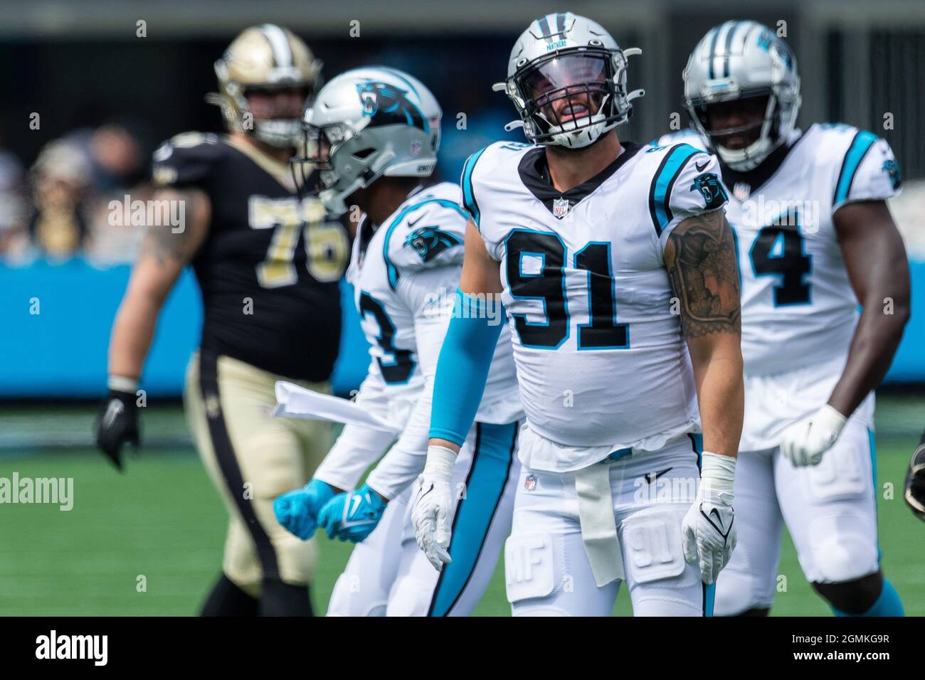 Carolina Panthers defensive end Morgan Fox (91) runs off the field