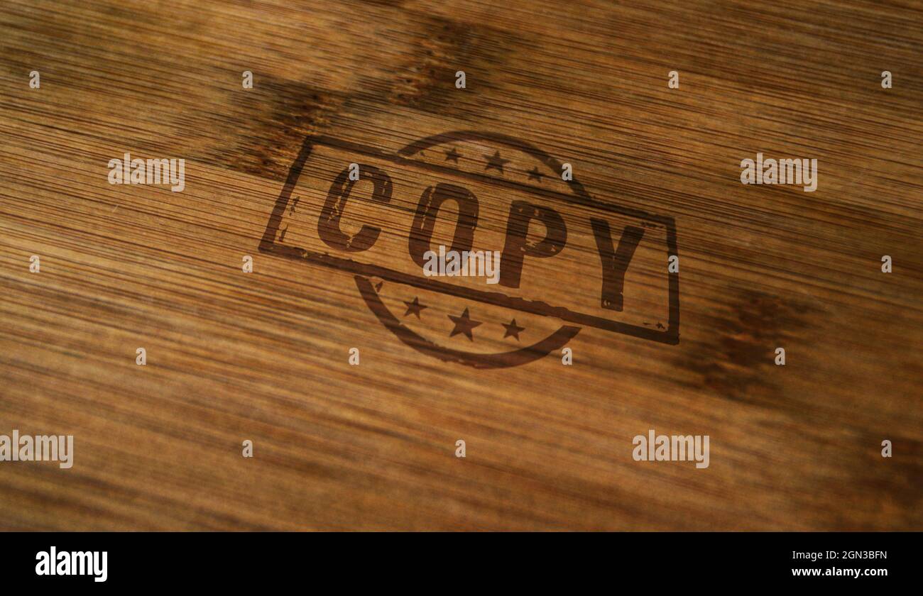 Sello de copia impreso en caja de madera. Concepto de reproducción y símbolo de documento duplicado. Foto de stock