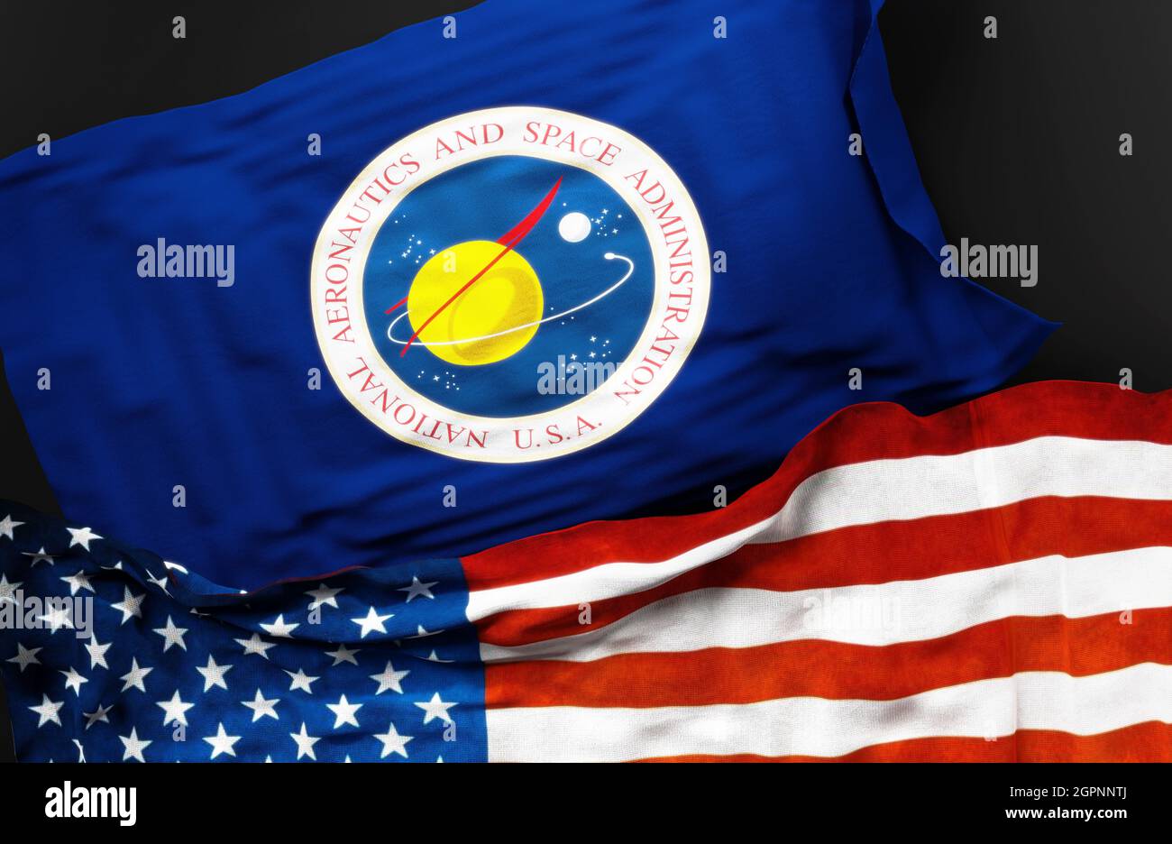 Bandera de la Administración Nacional de Aeronáutica y del Espacio de los Estados Unidos, junto con una bandera de los Estados Unidos de América como símbolo de una conexión Foto de stock