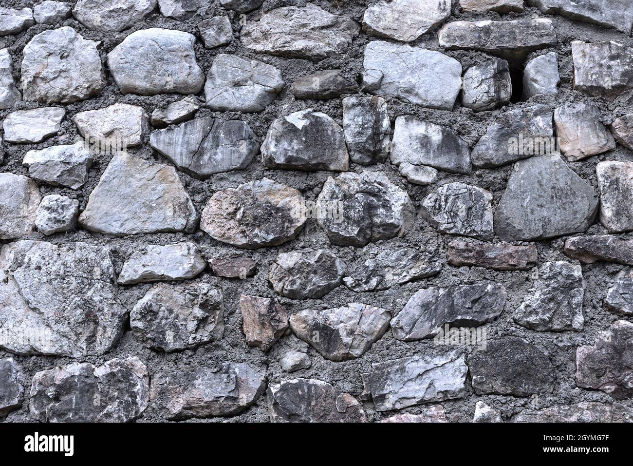 fondo de pared de piedra grungy, textura lista para su diseño Foto de stock