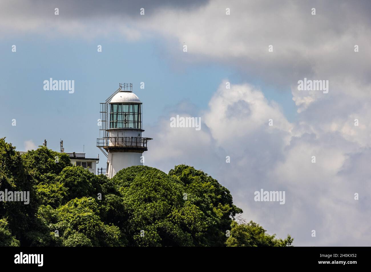 Faro Green Island Lighthouse al oeste del puerto Victoria Foto de stock