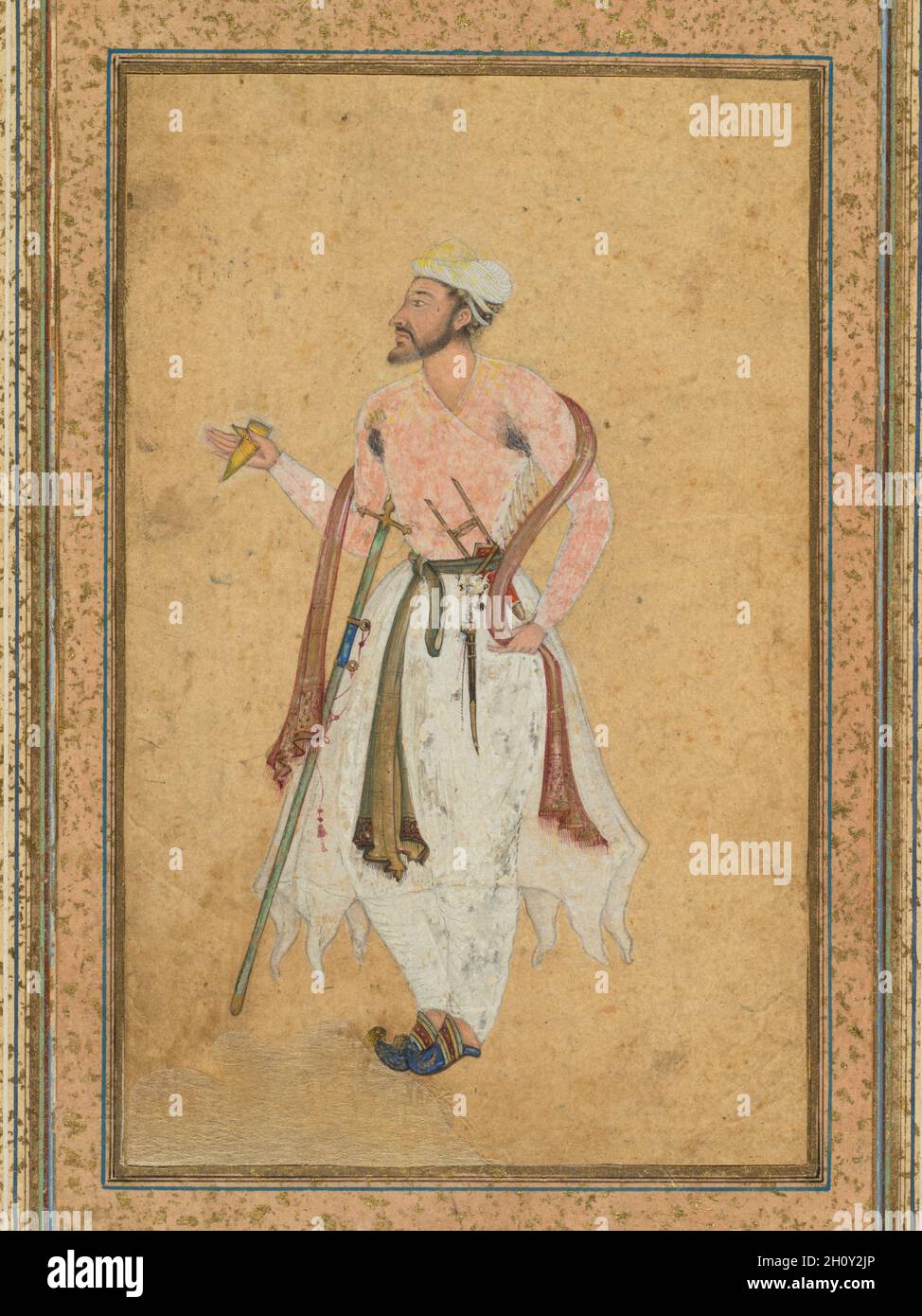 Un cortesano mogol, c. 1575; frontera agregado probablemente 1700. La India Mughal, siglo XVI. Acuarela opaca con oro en papel, montado con oro espolvoreado de fronteras; Foto de stock