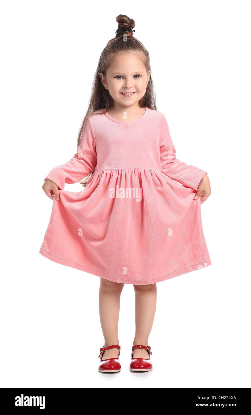 Linda niña en vestido rosa sobre fondo blanco Fotografía stock - Alamy