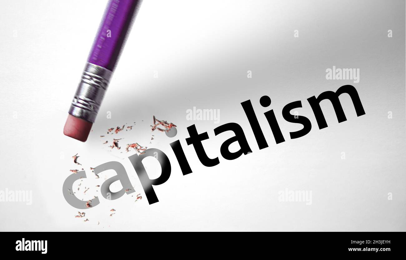 Eraser suprimiendo la palabra capitalismo Foto de stock