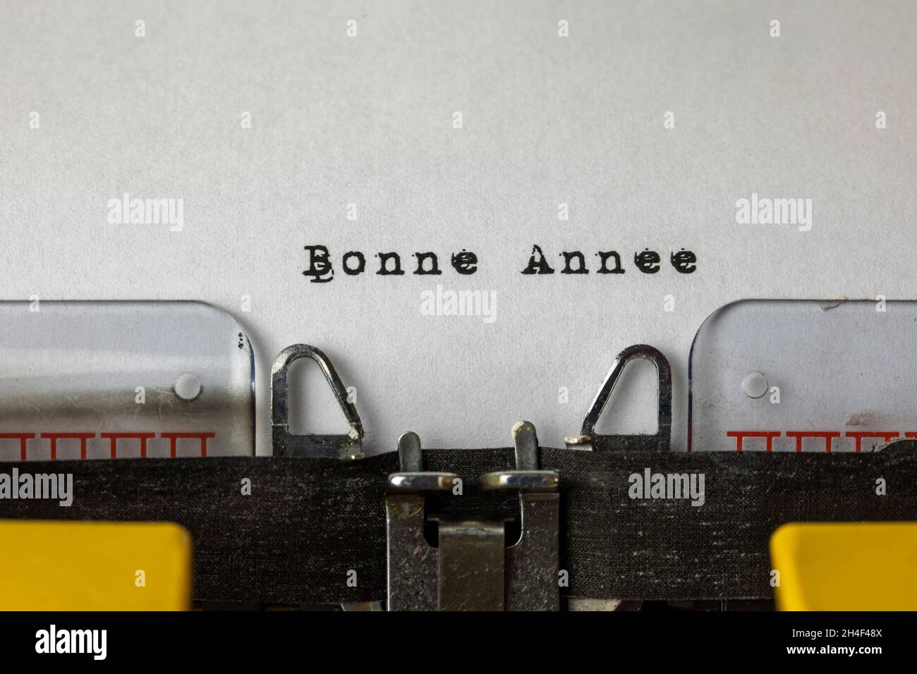 Bonne année escrito en una antigua máquina de escribir (2022 concepto) Foto de stock