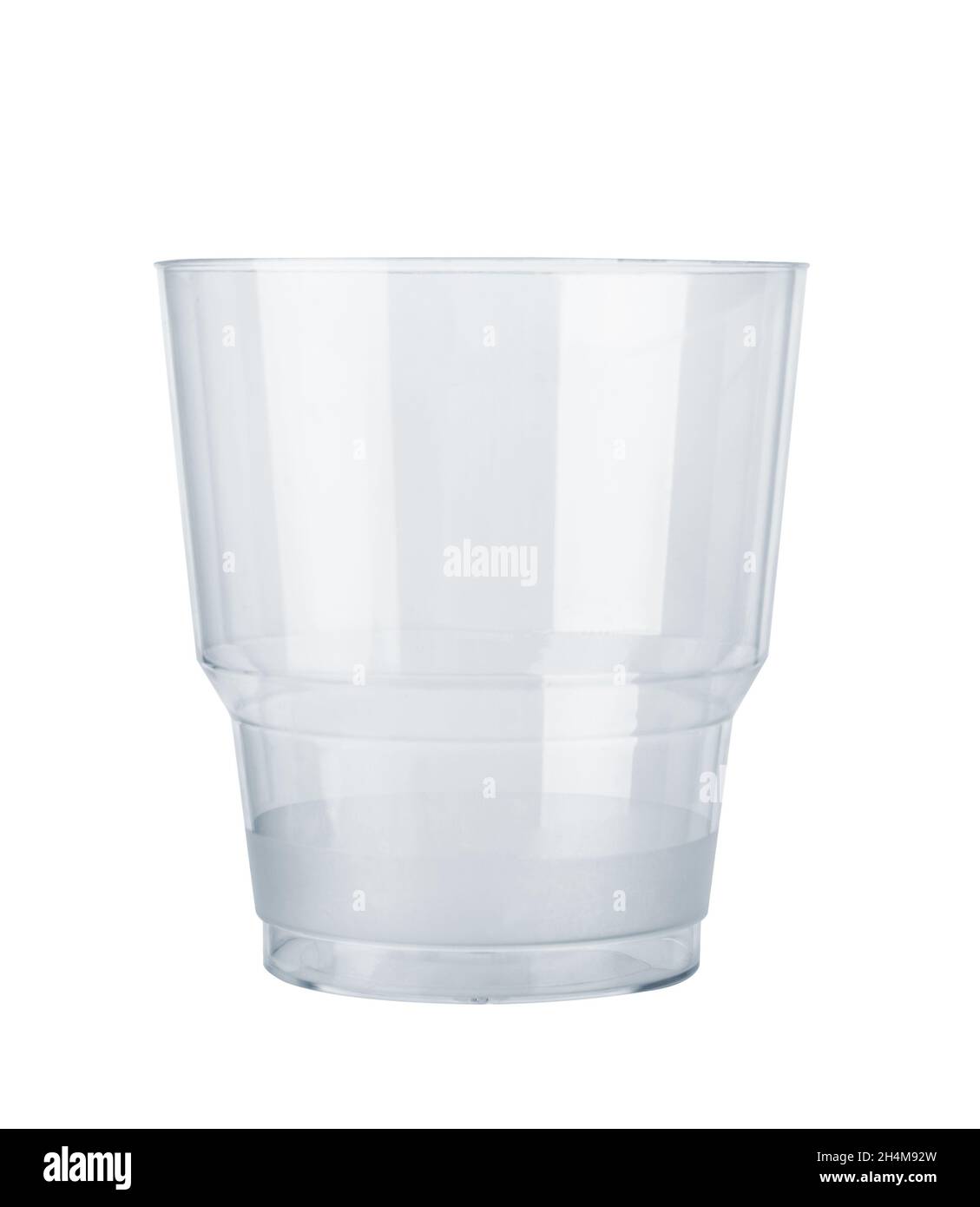 Un vaso vacío aislado sobre un fondo blanco Foto de stock