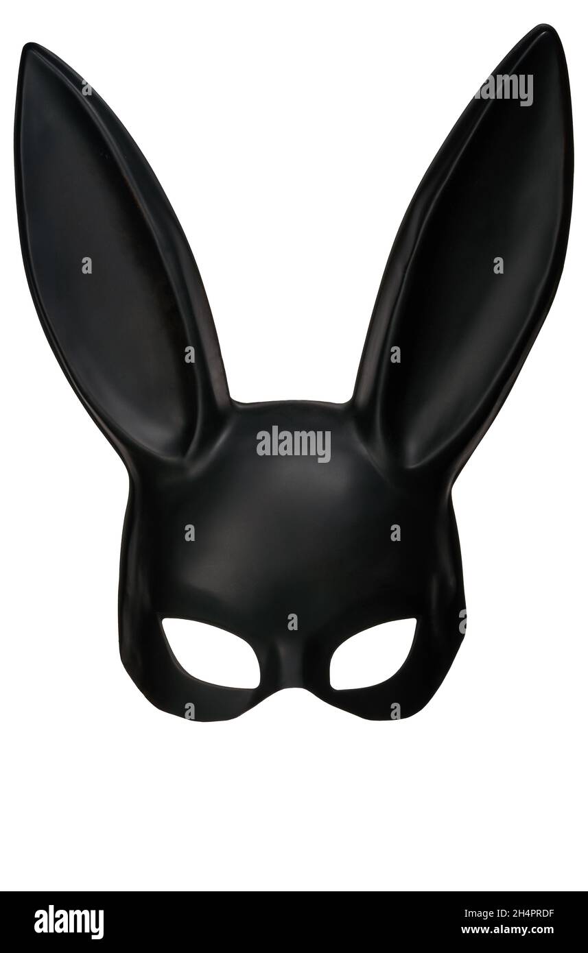 Primer plano vertical de una máscara de conejo negra sobre un fondo blanco  Fotografía de stock - Alamy