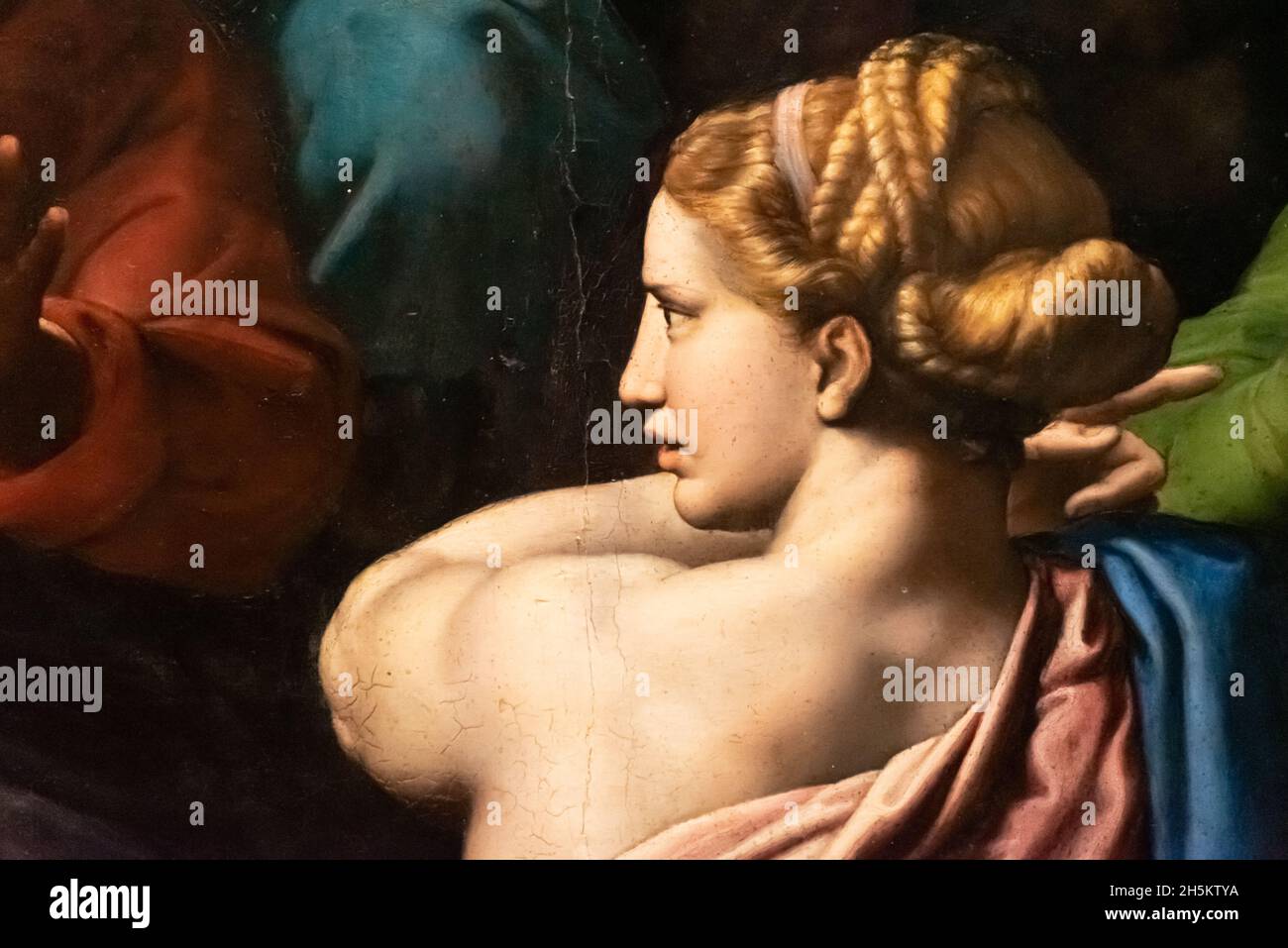 Detalle de pintura religiosa medieval que muestra la espalda de una mujer rubia y musculosa Foto de stock
