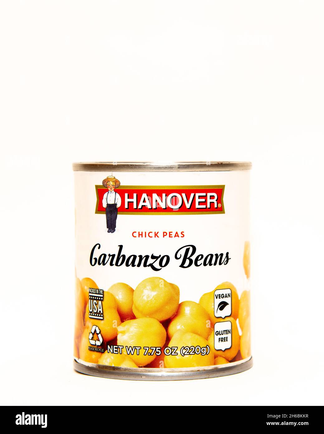 Una lata de habas de Garbanzo, o garbanzos, una legumbre cultivada utilizada como guarnición para ensaladas o cocinada con otros alimentos. Foto de stock