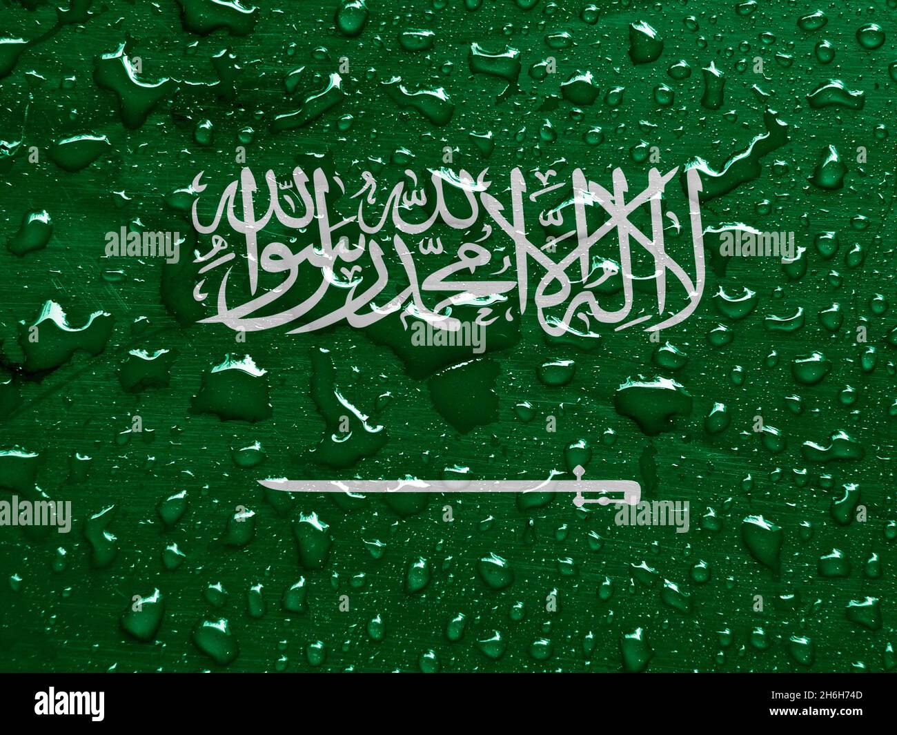 La bandera de Arabia Saudita con gotas de lluvia Foto de stock