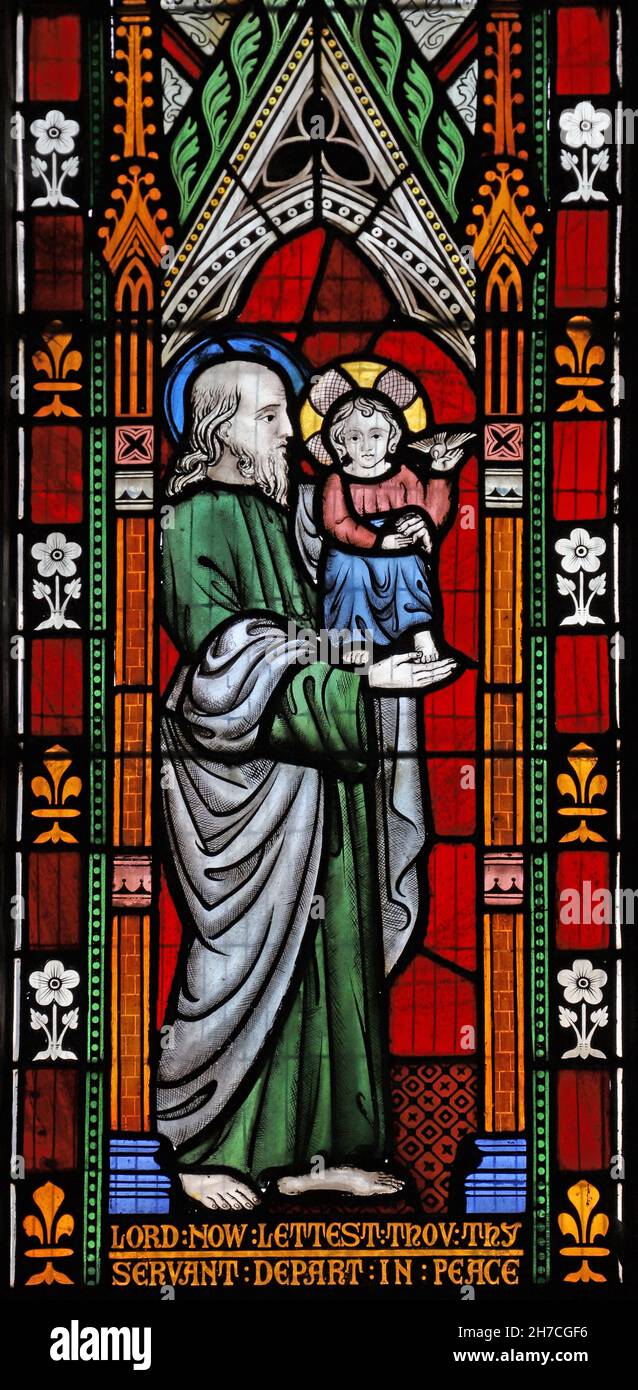 Una vidriera de Frederick Preedy que representa la Presentación del niño Jesús en el Templo, la Iglesia de San Santiago, Badsey, Worcestershire Foto de stock