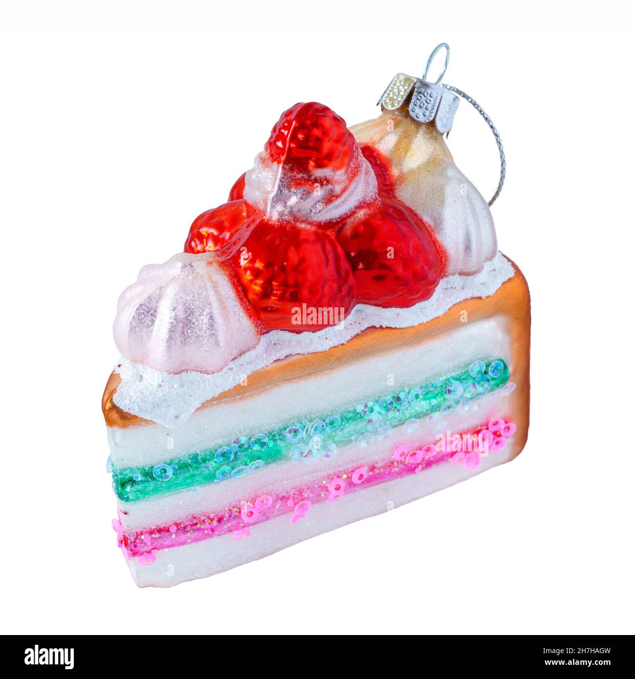 Adorno de Navidad de cristal colgante en forma de pastel de capa decorado. Foto de stock